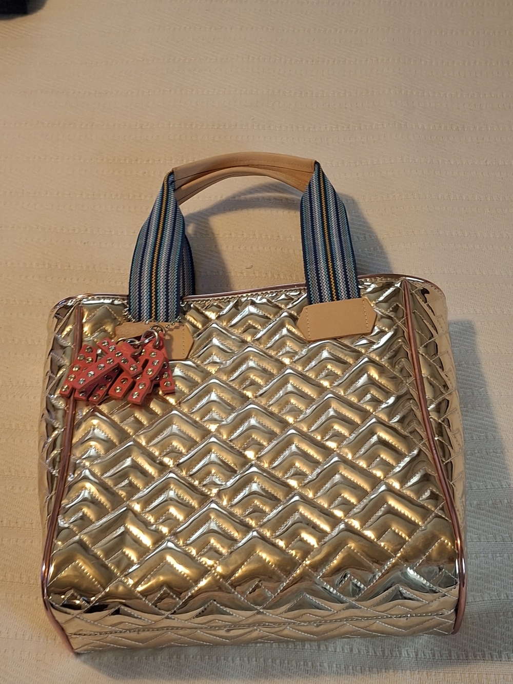 Gold Quilted Tote Bag with Striped Handles